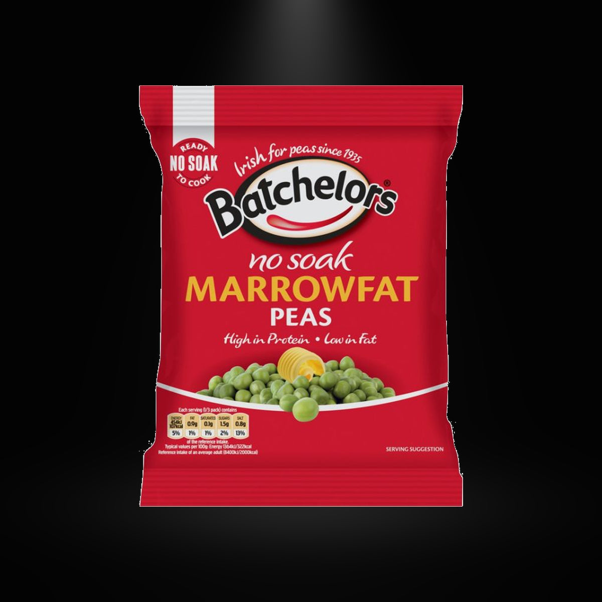 Batchelors Marrowfat Peas 100gm on black background with overhead spotlight