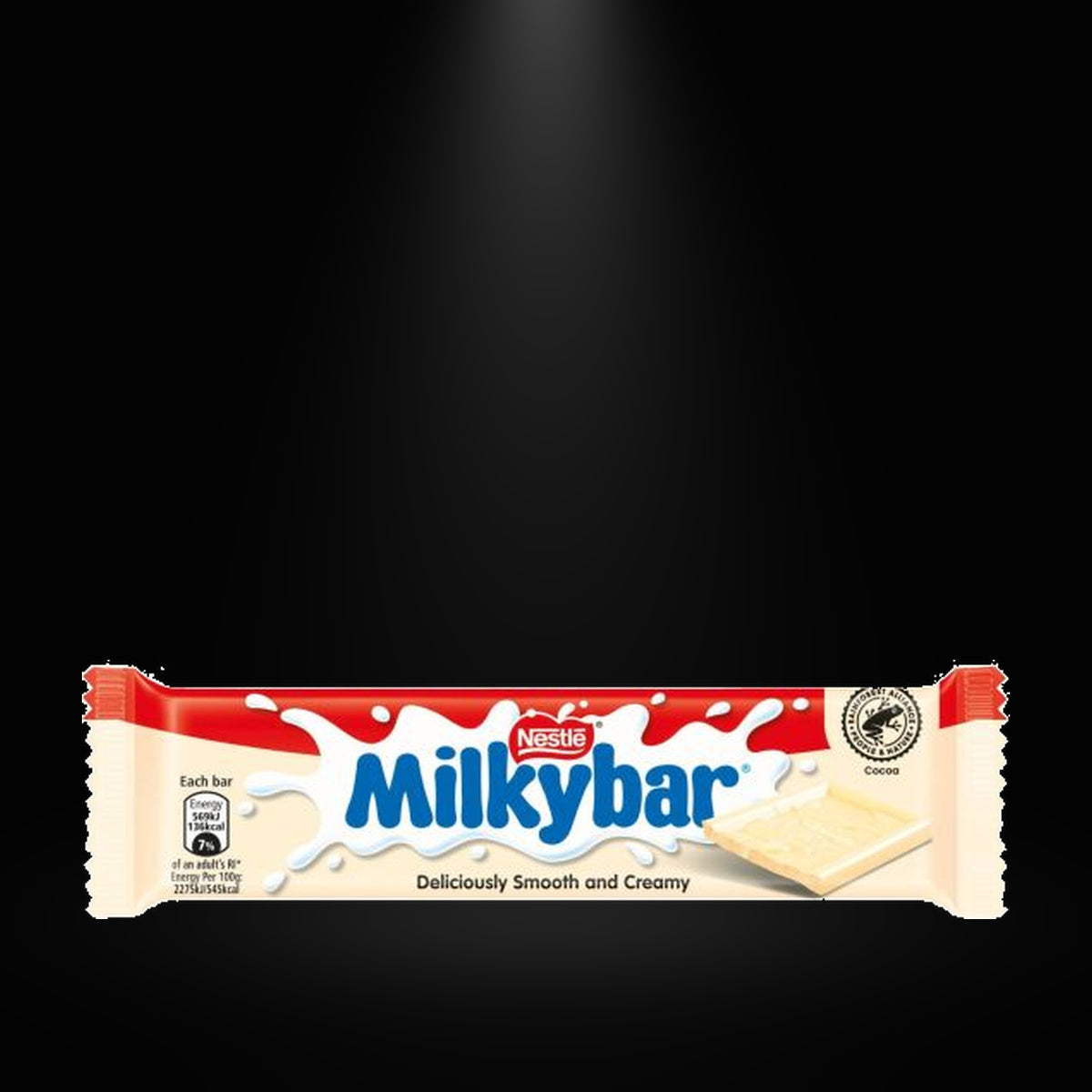 Milkybar 4pk on black background with overhead spotlight