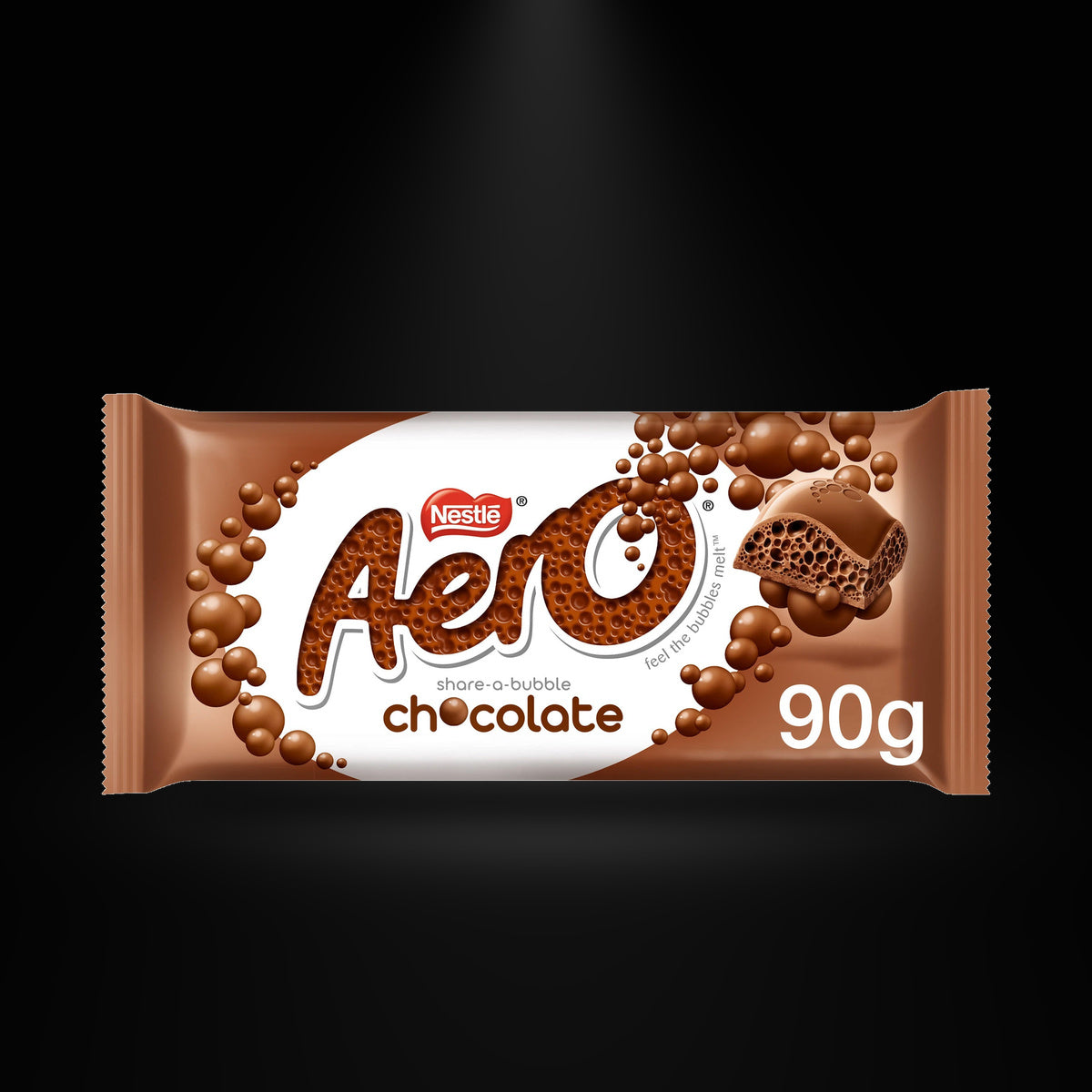 Aero Chocolate 90 gm on a black background with an overhead spotlight
