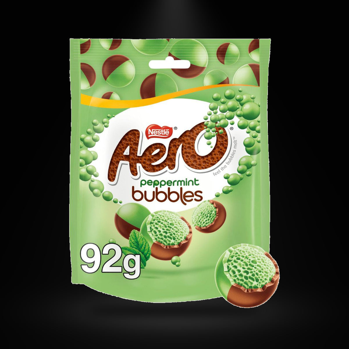 Aero peppermint pouch on a black background with an overhead spotlight