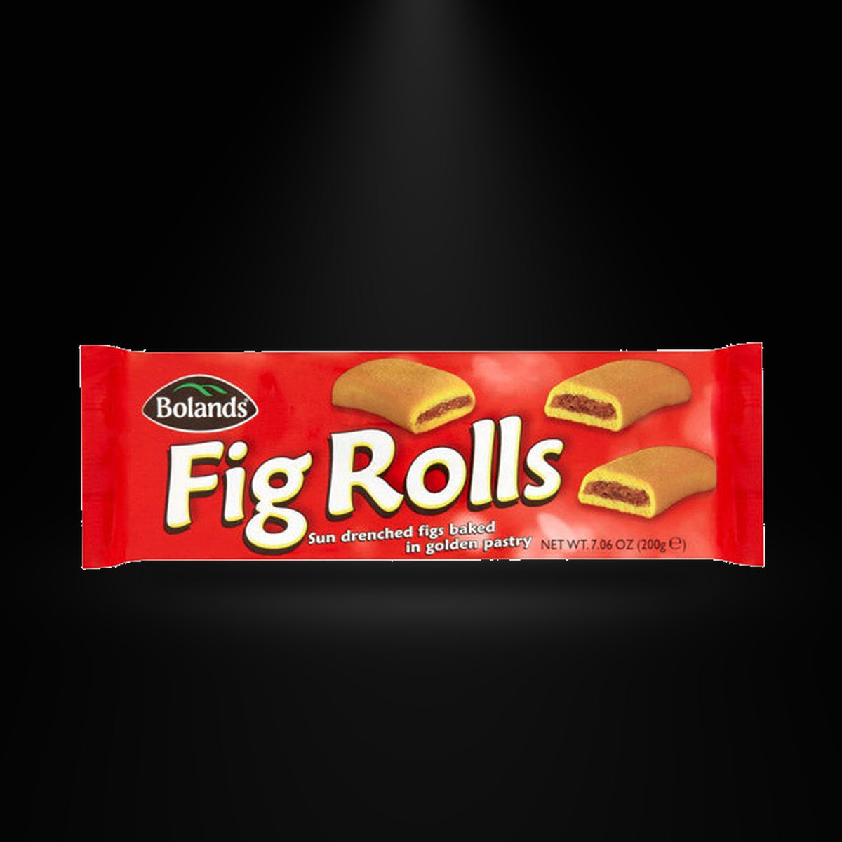 Bolands Fig rolls on a black background with an overhead spotlight