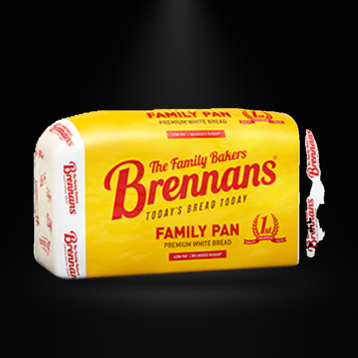 Brennan's Family Pan on a black background with an overhead spotlight