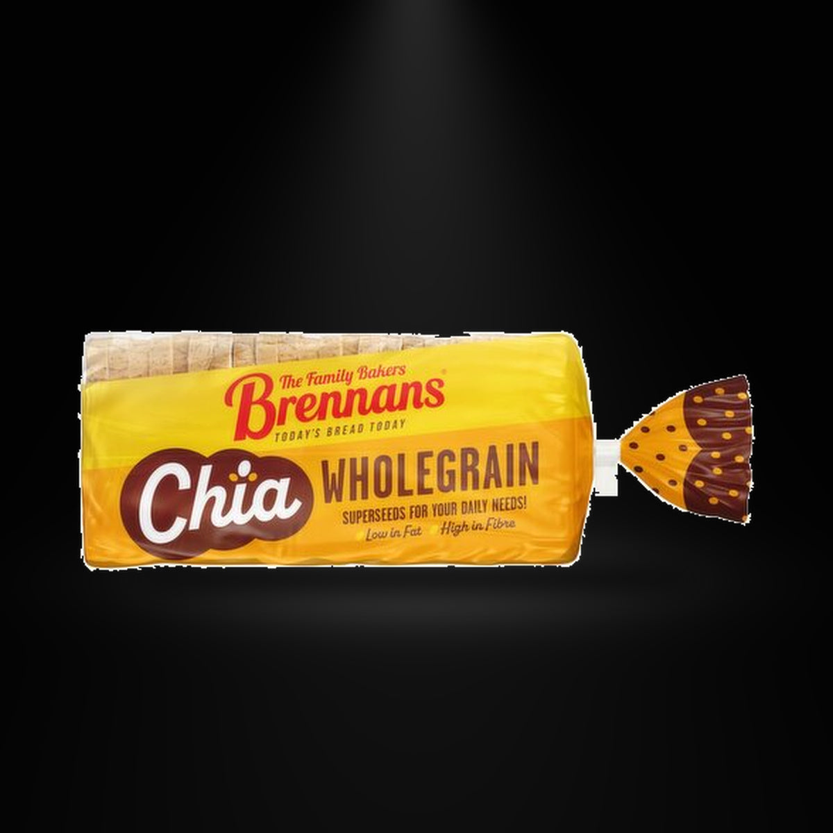 Brennans Chia Wholegrain Bread on a black background with an overhead spotlight
