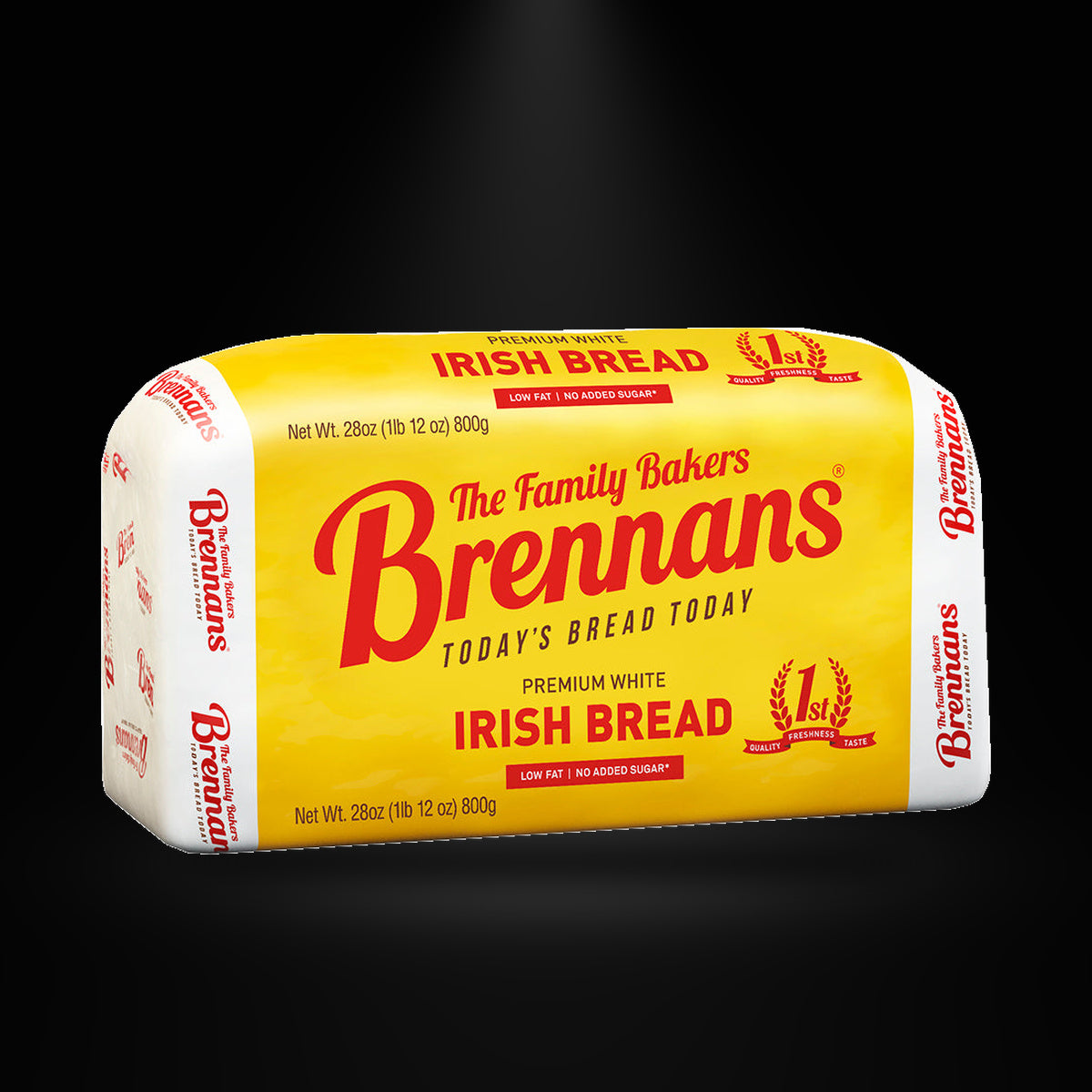 Brennans white 800g on a black background with an overhead spotlight