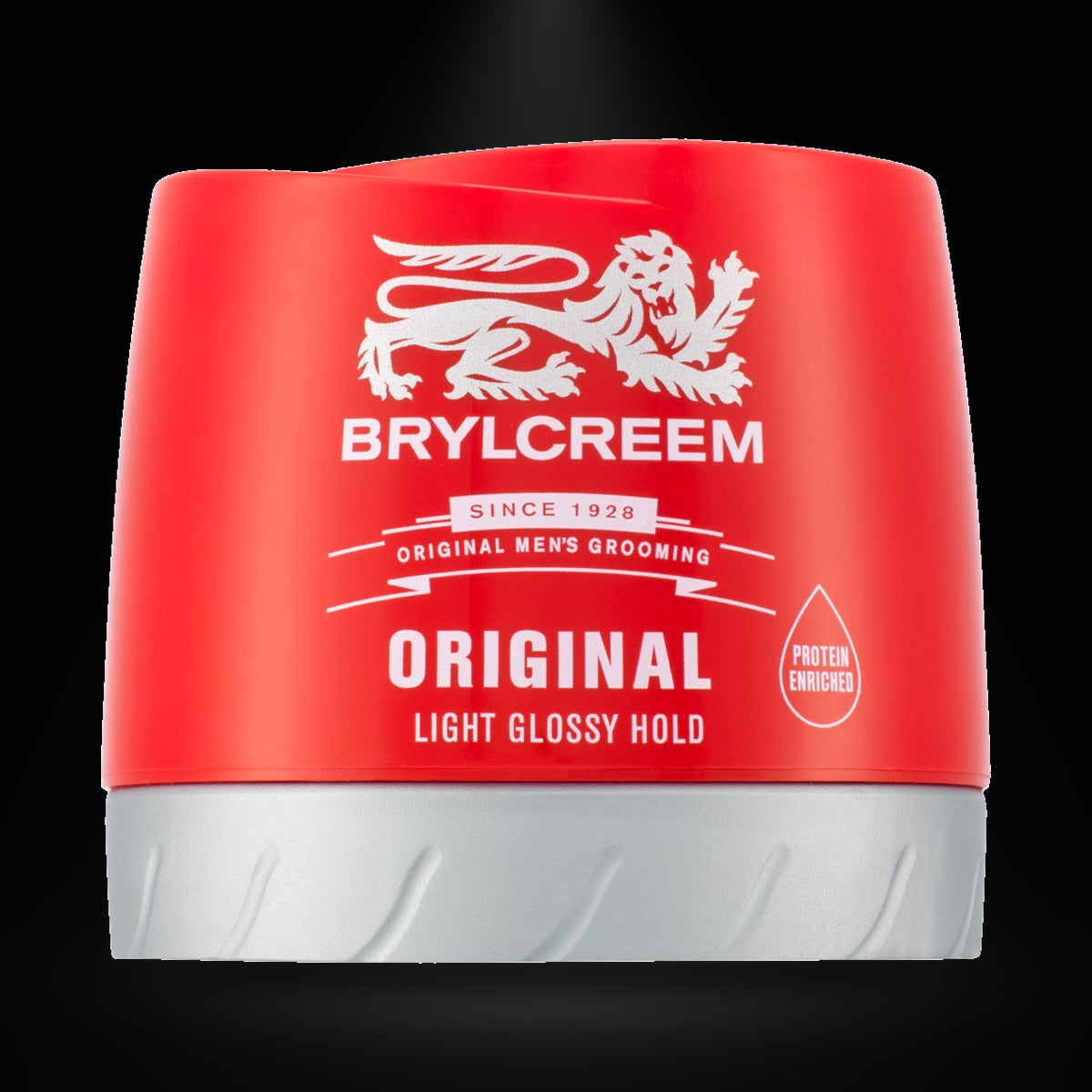 Brylcreem 150ML on a black background with an overhead spotlight