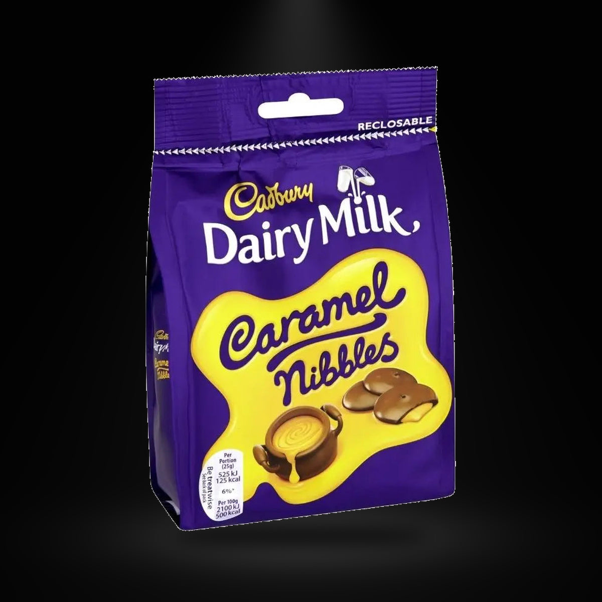 CA Caramel nibbles on a black background with an overhead spotlight