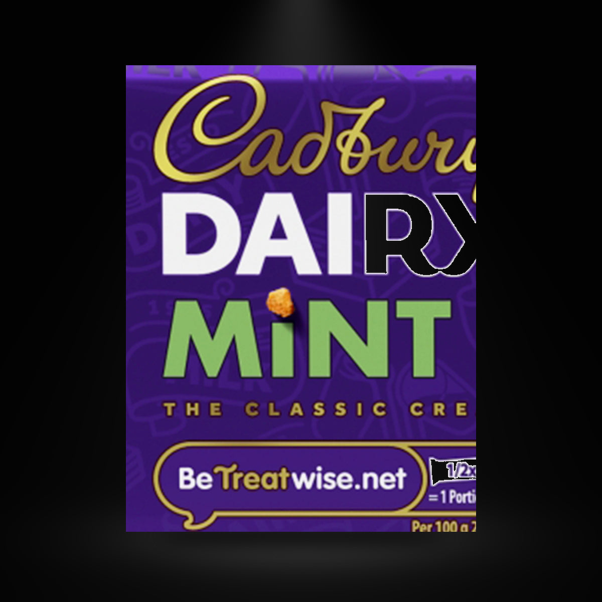 CA Dairy Milk Mint 53g on a black background with an overhead spotlight