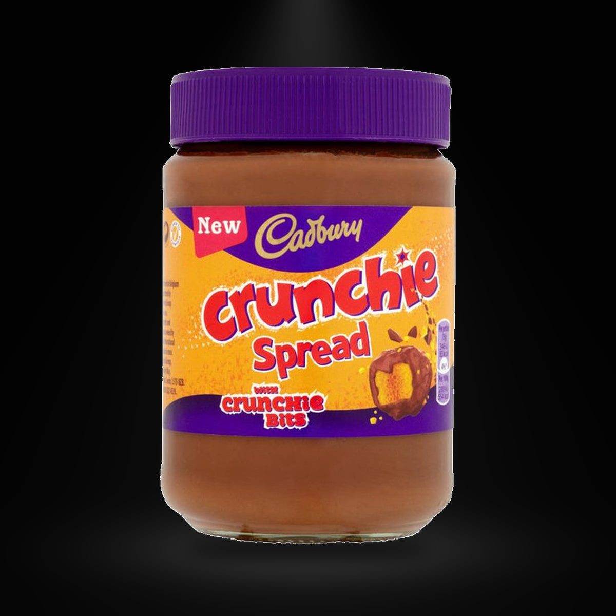 Cadbury Crunchie Spread on a black background with an overhead spotlight