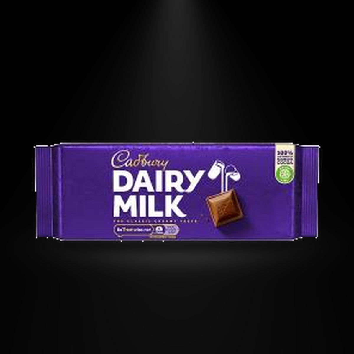 Cadbury Dairy Milk 180 gm on a black background with an overhead spotlight