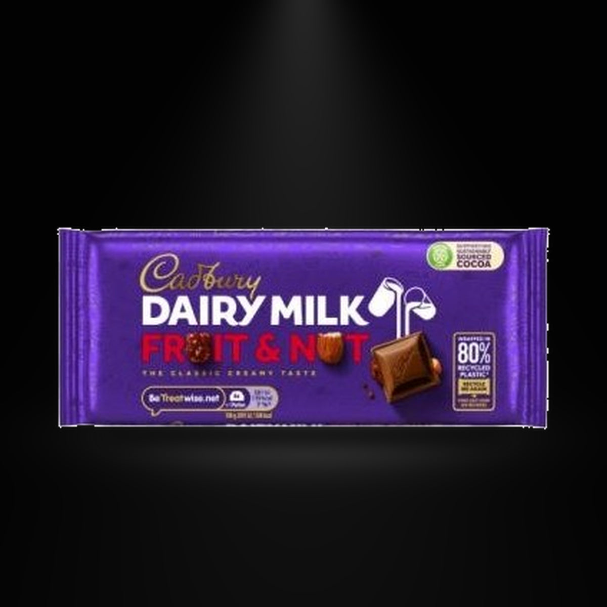 Cadbury Dairy Milk Fruit & Nut 110g on a black background with an overhead spotlight