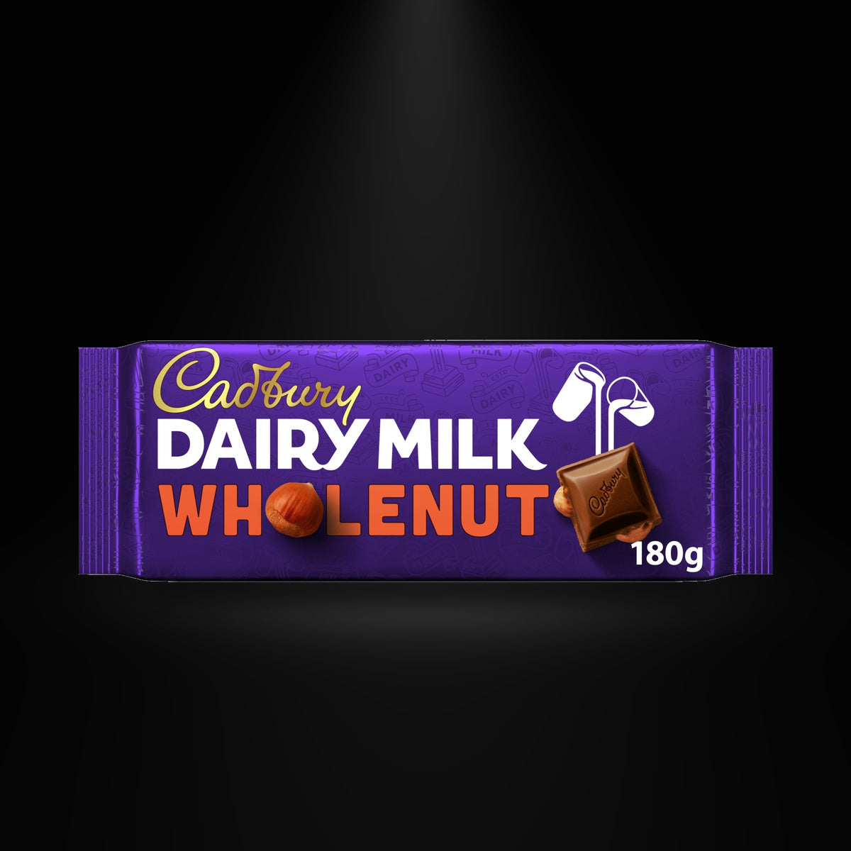 Cadbury Dairy Milk Wholenut 180 G on a black background with an overhead spotlight