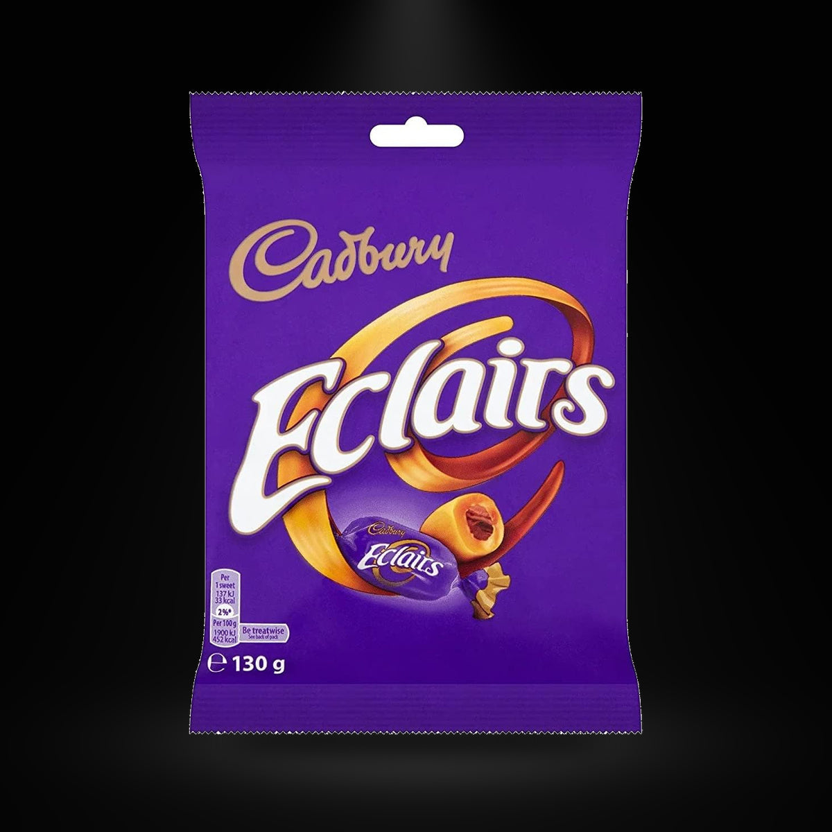 Cadbury Eclairs Pouch 130G on a black background with an overhead spotlight
