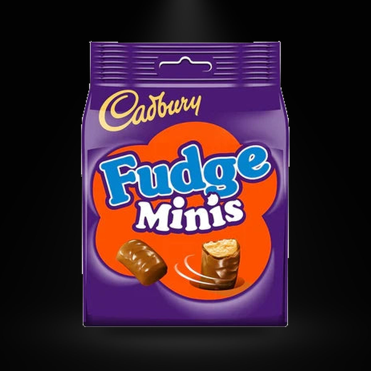 Cadbury Fudge Minis on a black background with an overhead spotlight