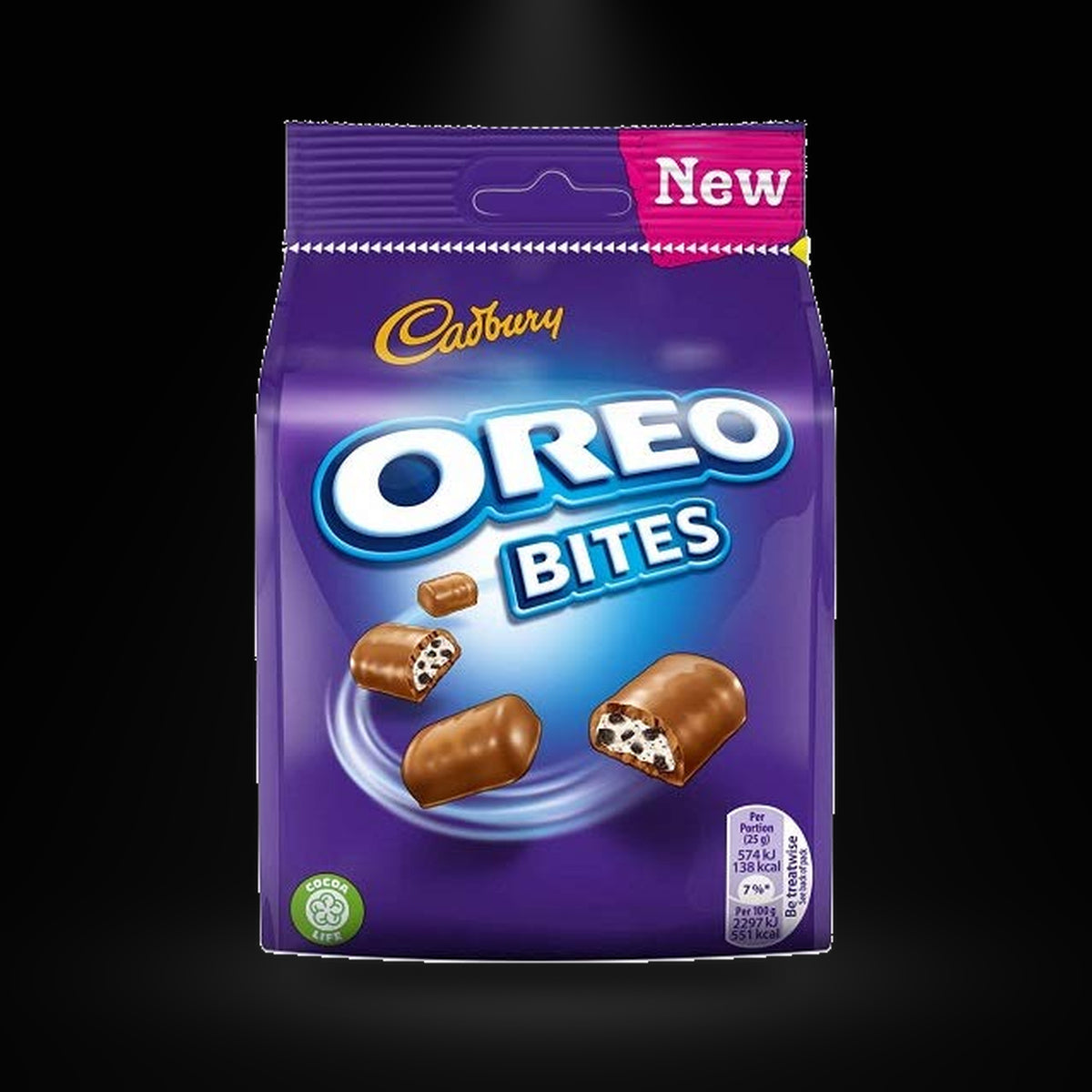 Cadbury Oreo Bites 100g Bag on a black background with an overhead spotlight