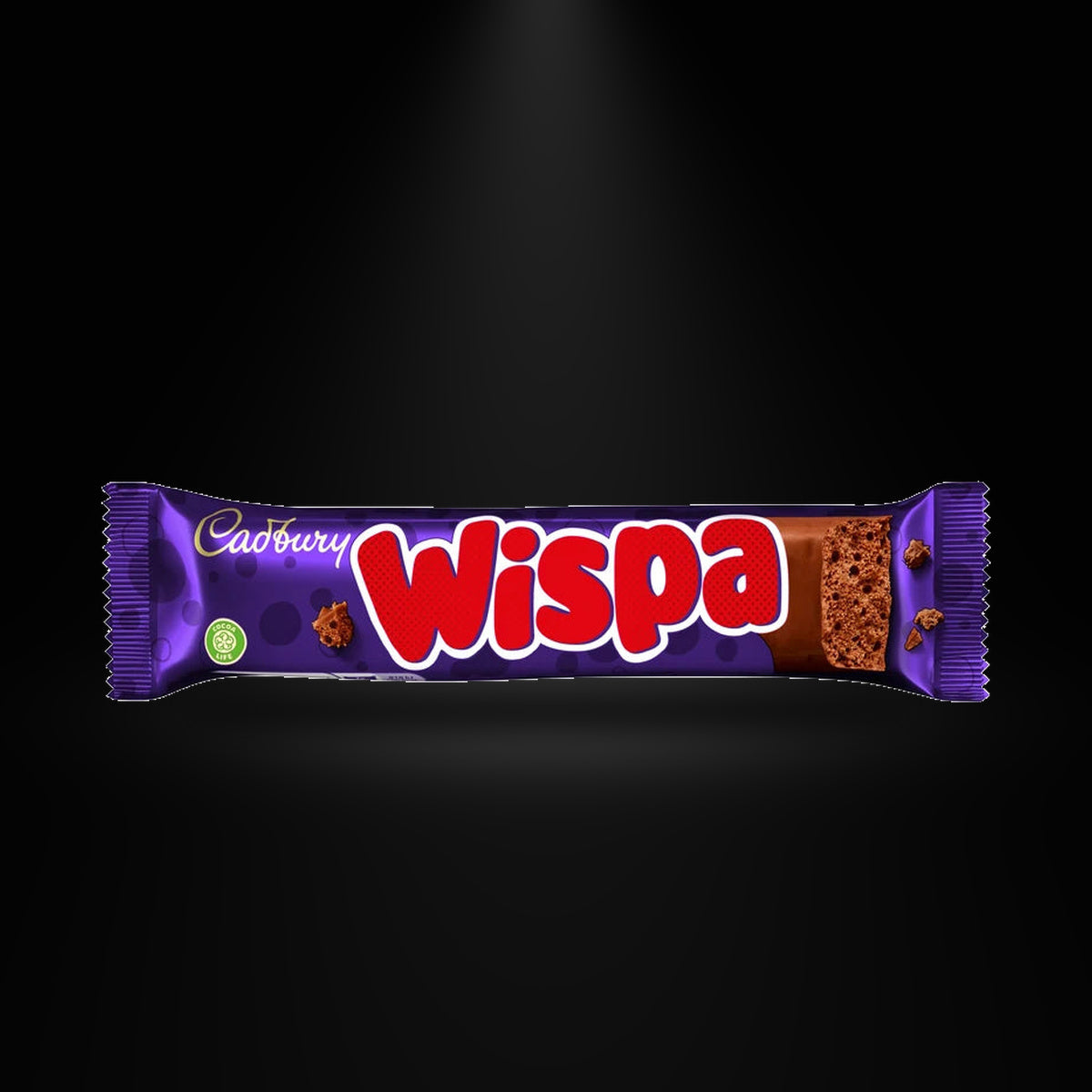 Cadbury Wispa on a black background with an overhead spotlight