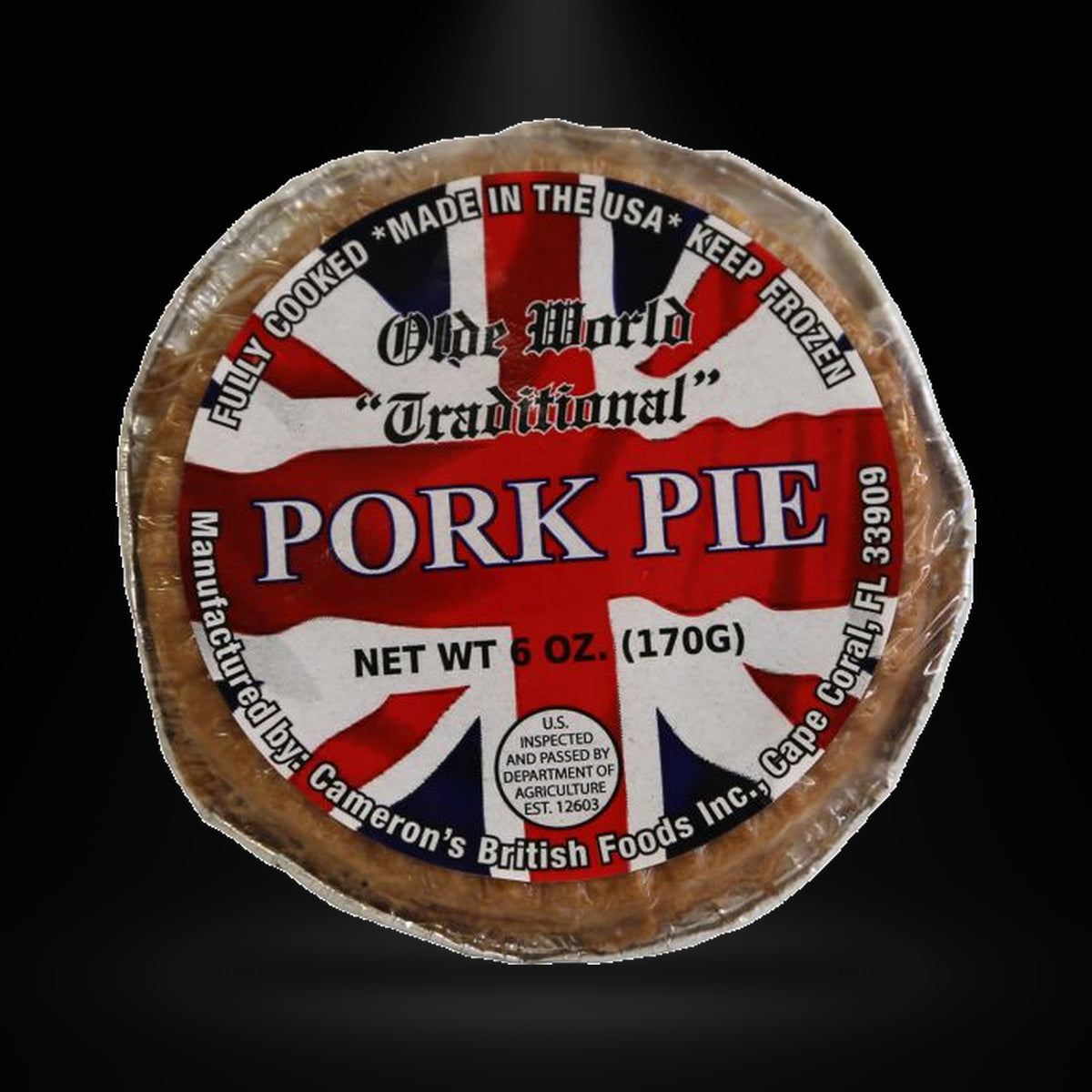 Cameron's Pork Pie 170G on a black background with an overhead spotlight