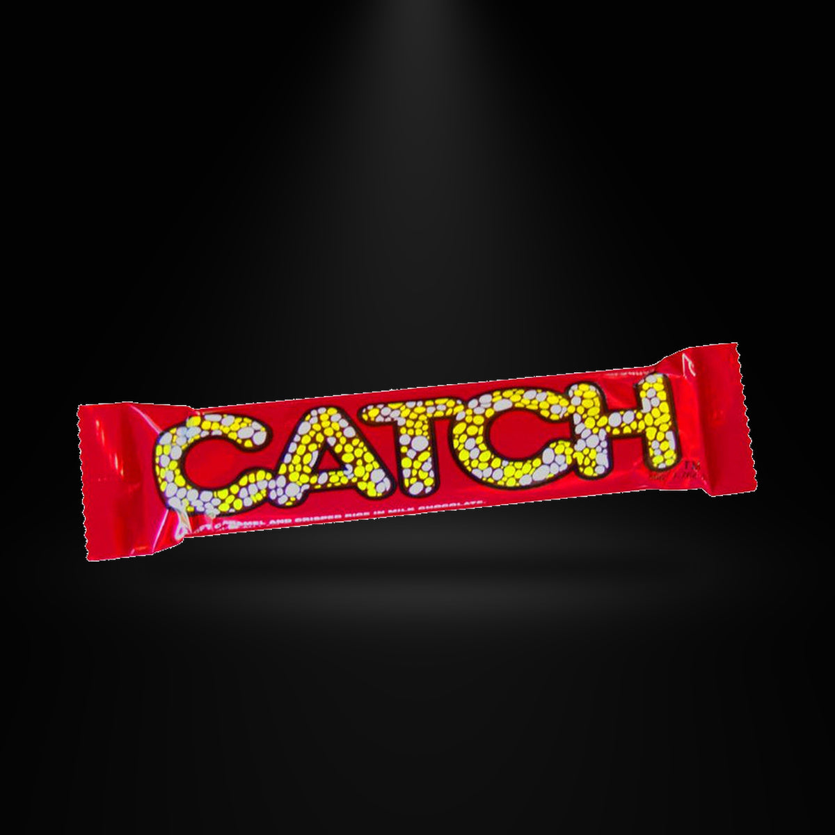 Catch Candy Bar - 1.764 Oz on a black background with an overhead spotlight