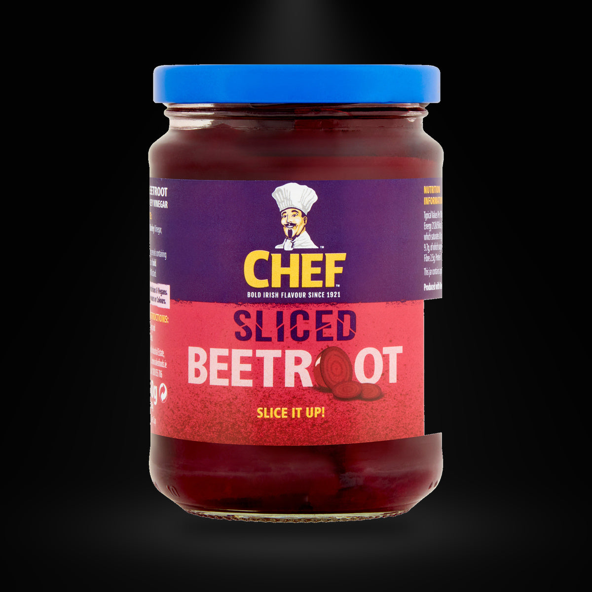 Chef Beetroot on a black background with an overhead spotlight