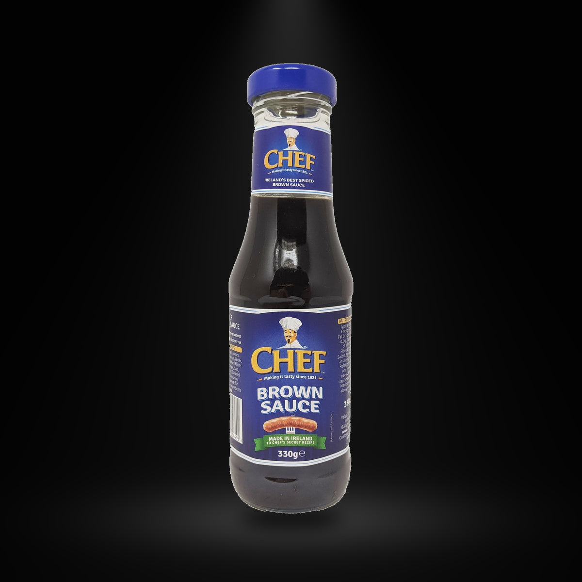 Chef brown 330g on a black background with an overhead spotlight