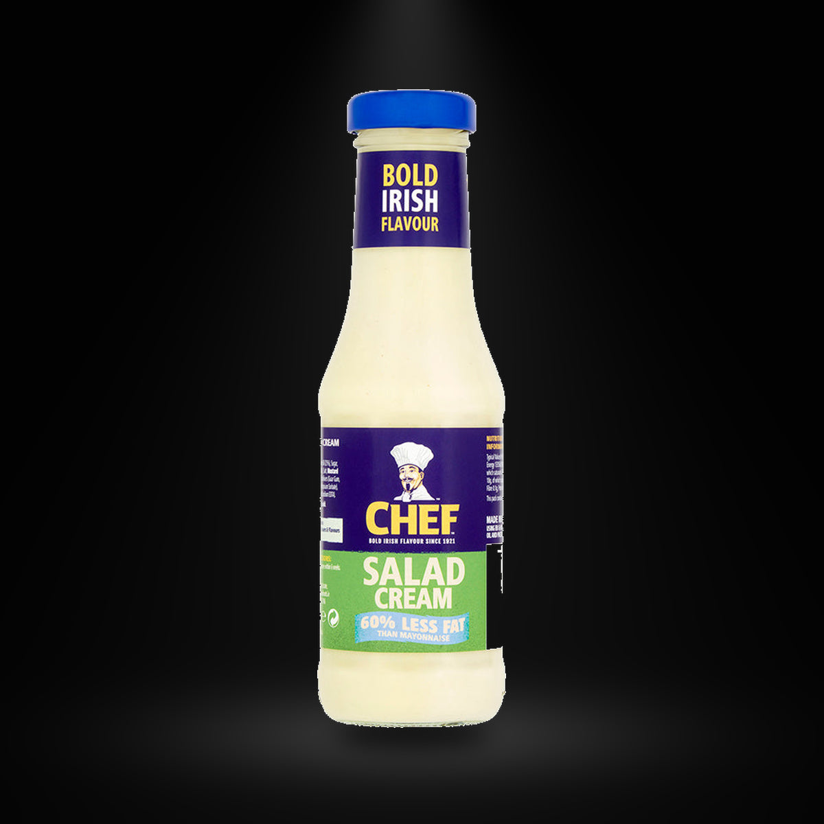 Chef Salad Cream 315 g btl on a black background with an overhead spotlight