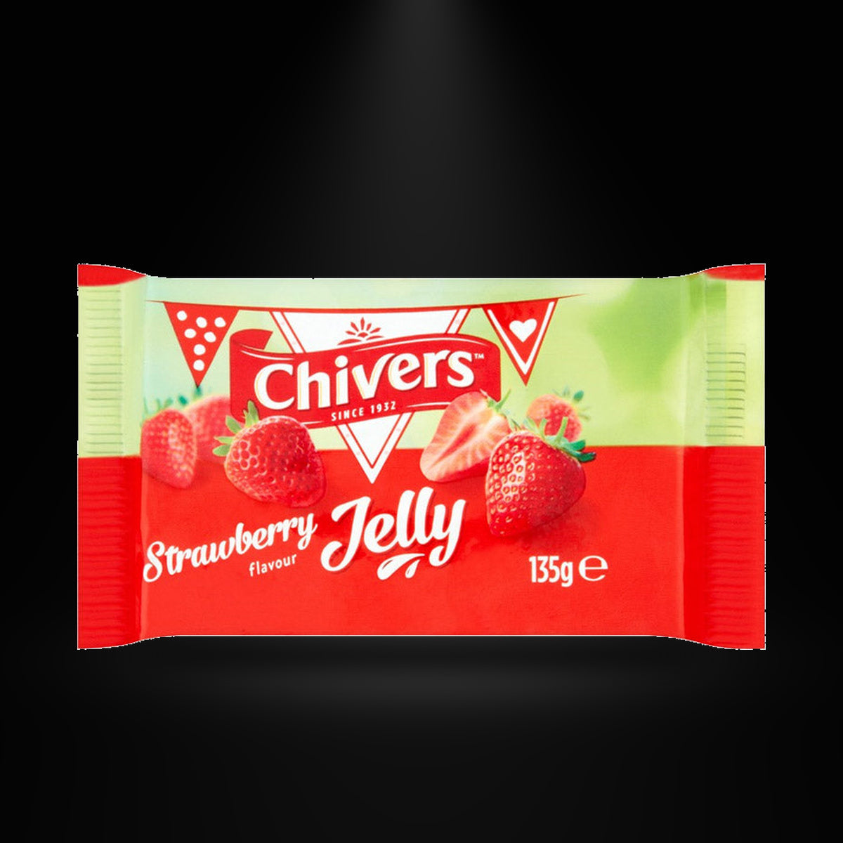Chivers Strawberry Jelly 135gm on a black background with an overhead spotlight