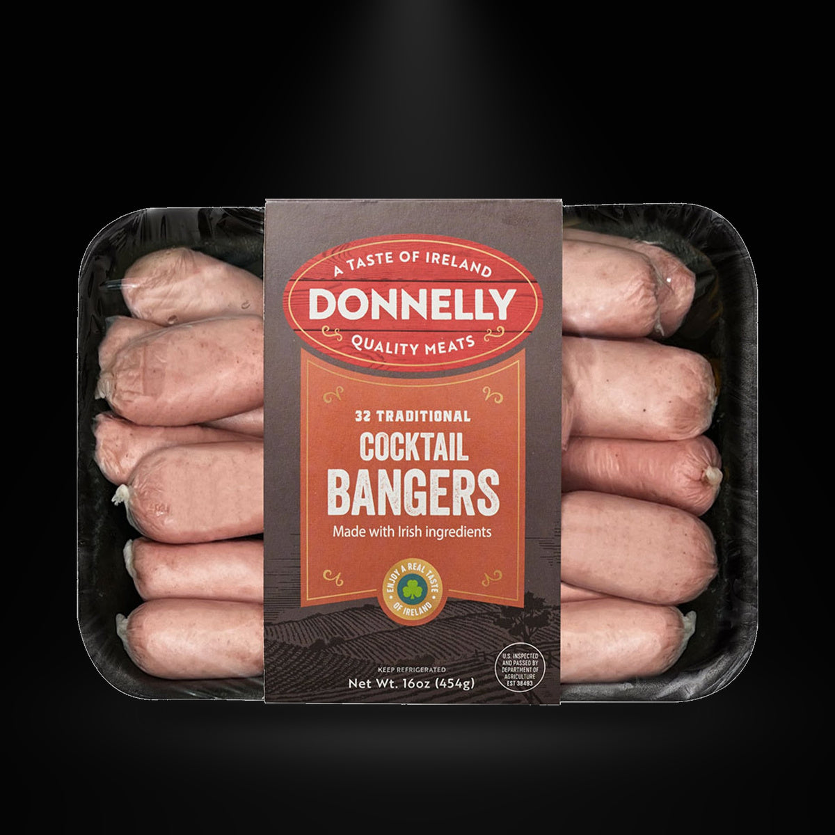 Donnelly cocktail bangers on a black background with an overhead spotlight