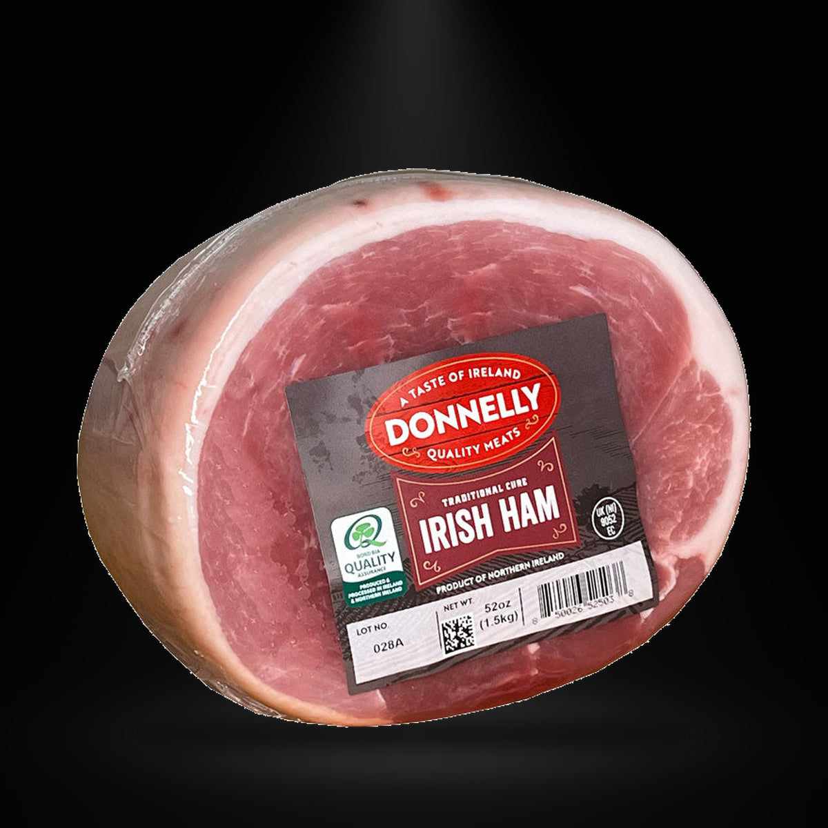 Donnelly Irish Ham 1.5 kg on a black background with an overhead spotlight