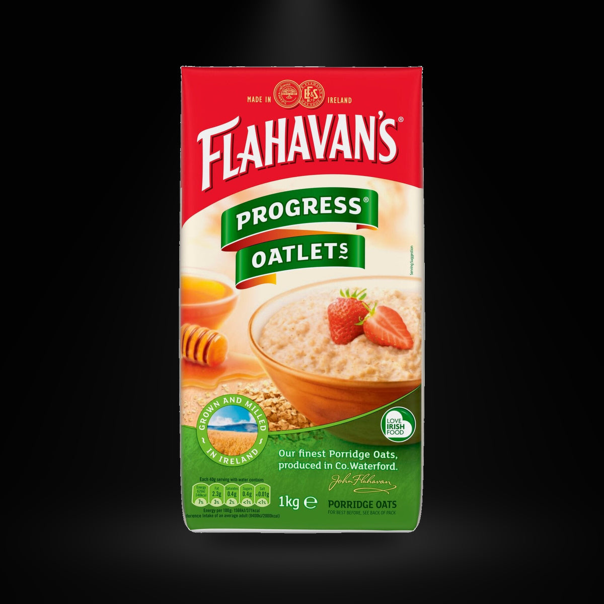 Flagavan's Progress Oatlets 1kg on a black background with an overhead spotlight