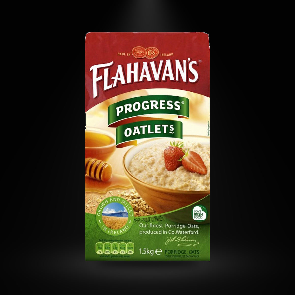 Flahavan's Oatmeal on a black background with an overhead spotlight