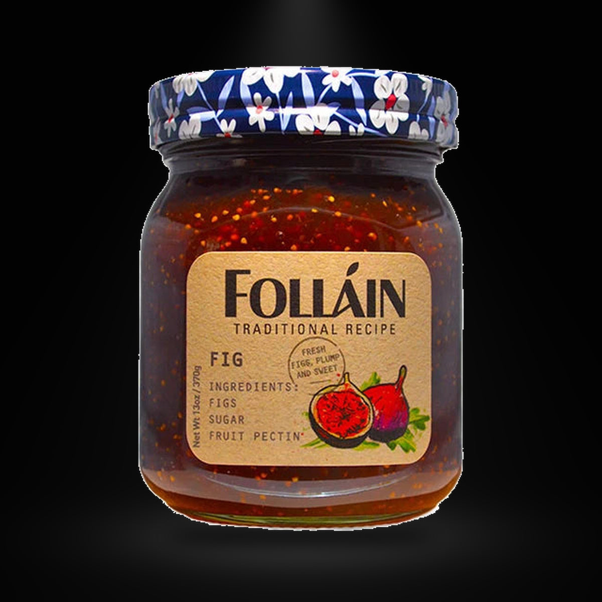Follain Fig Traditional 370G on a black background with an overhead spotlight