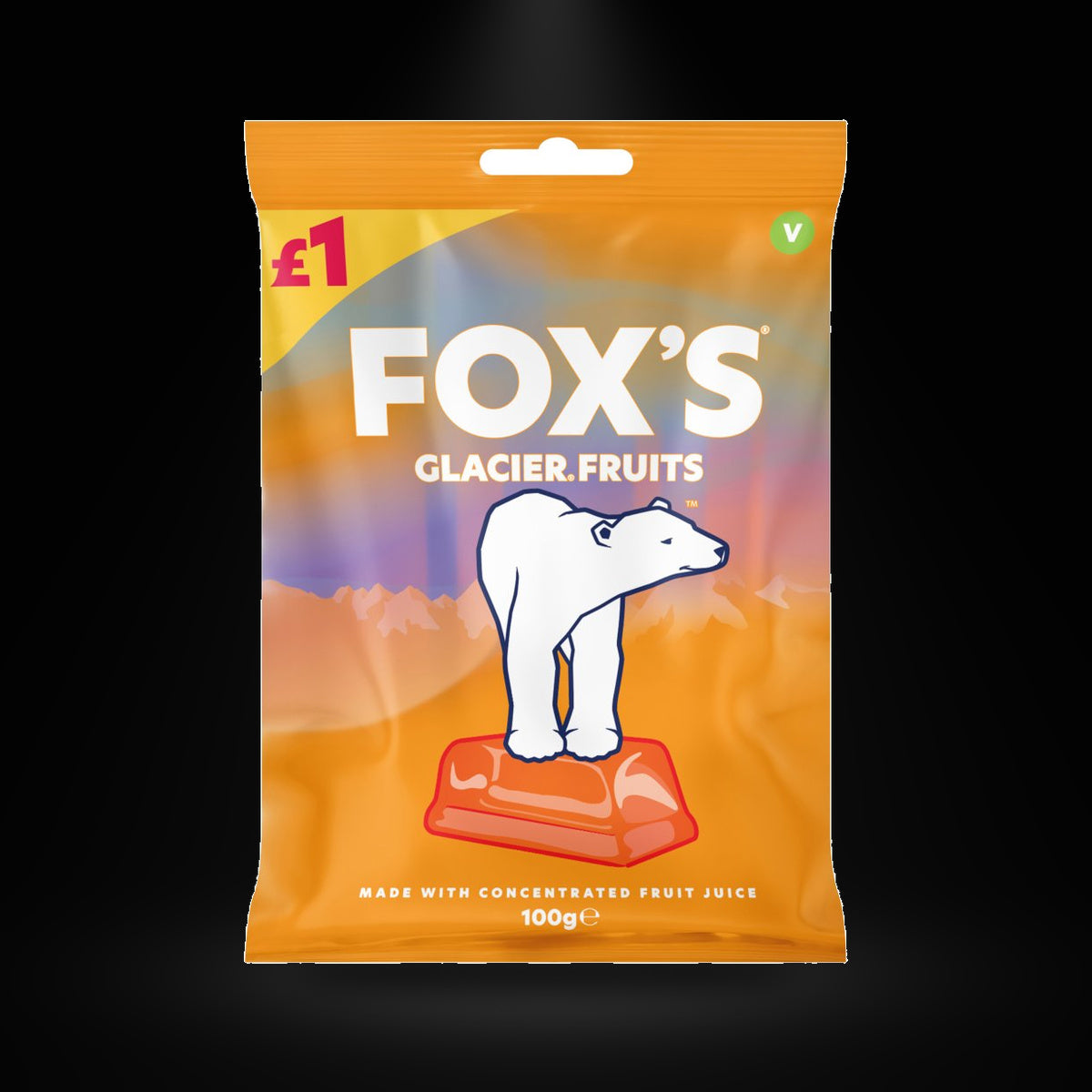 Fox glac. fruits 100g on a black background with an overhead spotlight