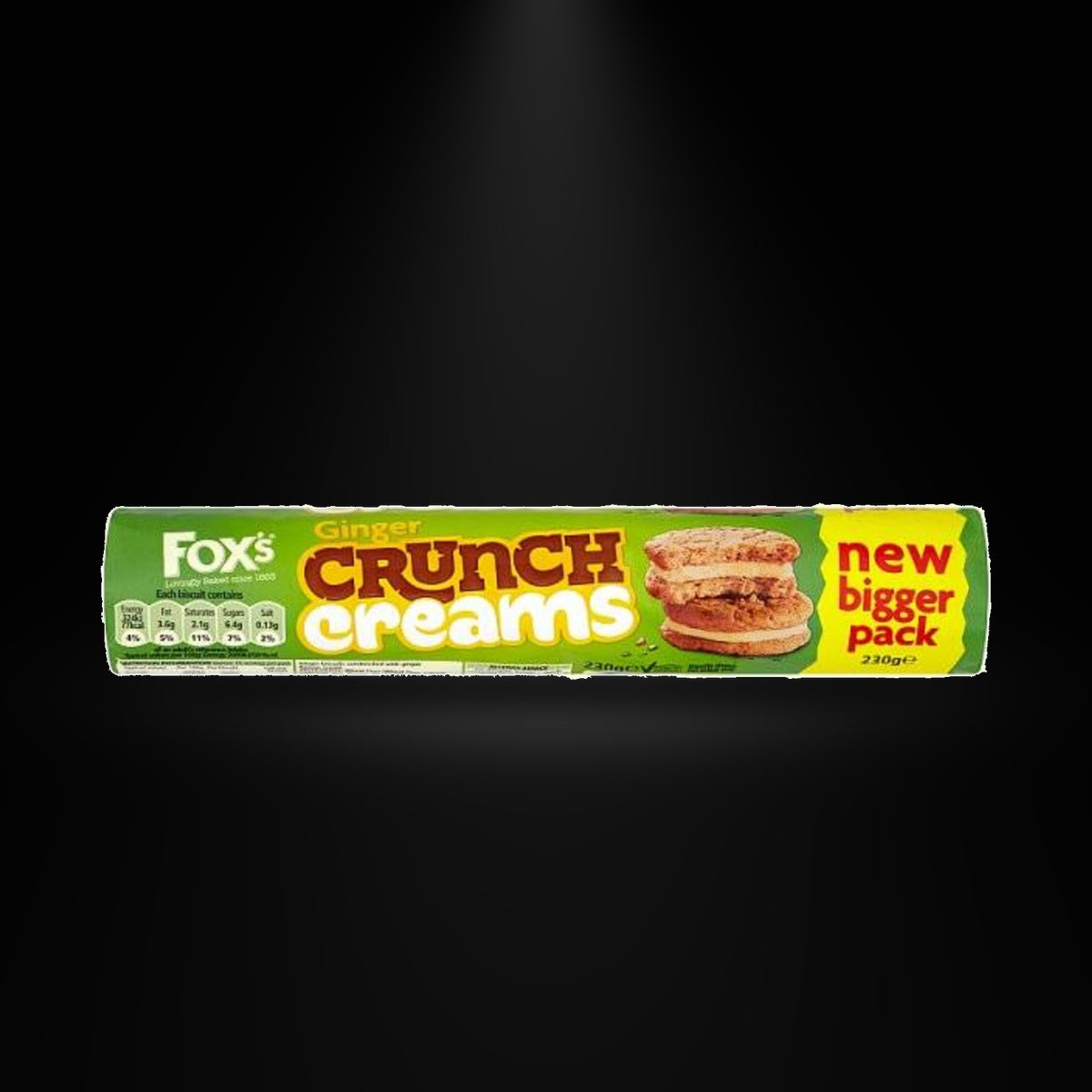Fox's Crunch Creams Ginger 200gm on a black background with an overhead spotlight