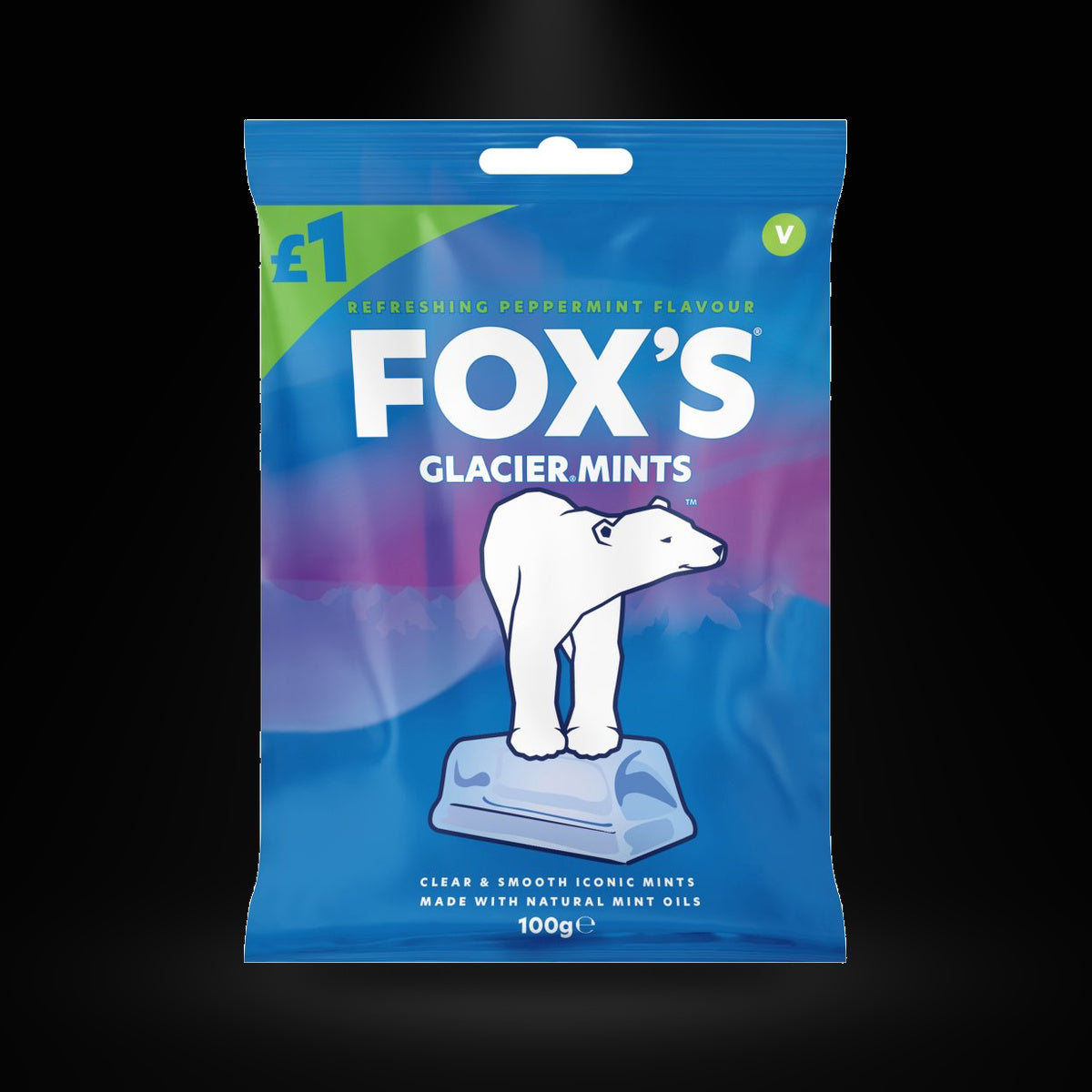 Fox's Glacier Mints on a black background with an overhead spotlight