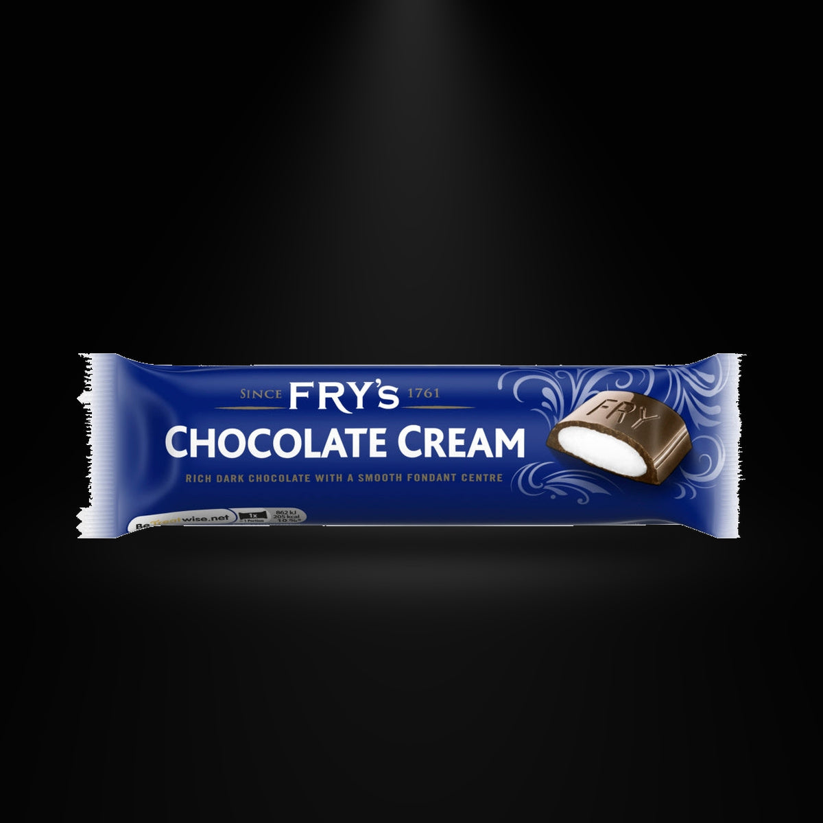 Fry's Chocolate Cream 49gm on a black background with an overhead spotlight