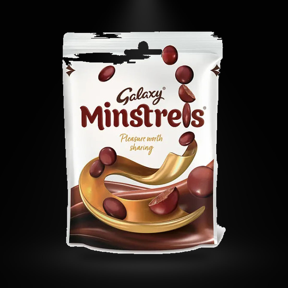 Galaxy Minstrels 118g on a black background with an overhead spotlight