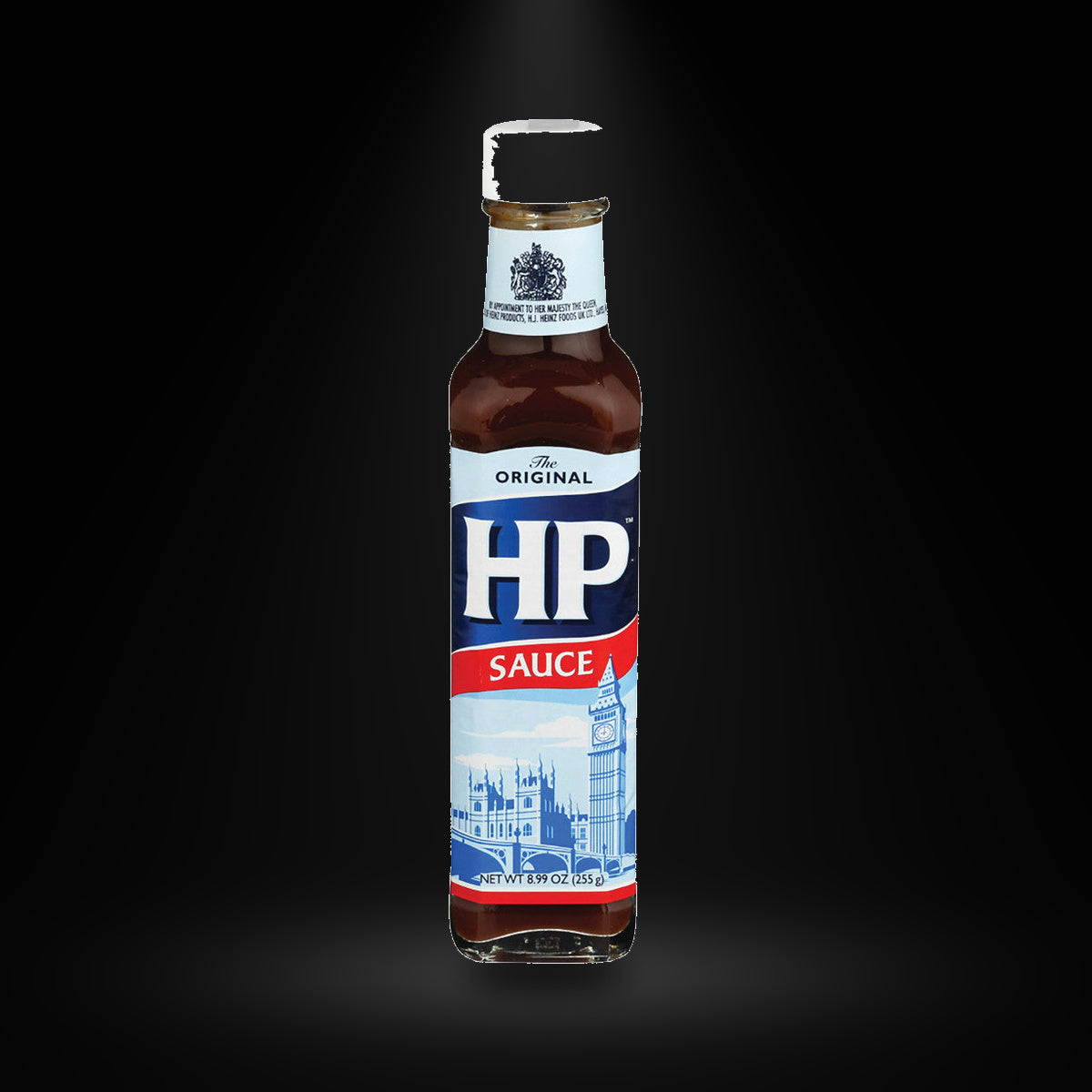 HP Sauce 9oz on a black background with an overhead spotlight