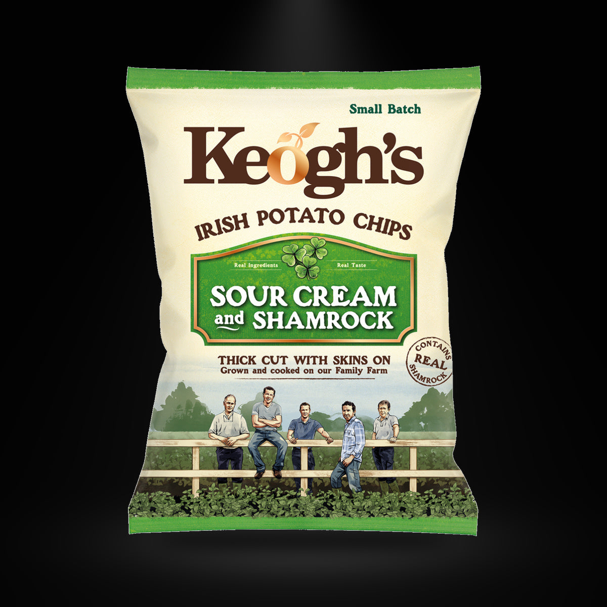 Keoghs Sour C and shamrock on a black background with an overhead spotlight