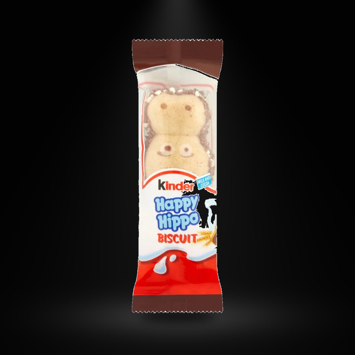 Kinder Happy Hippo Hazelnut on a black background with an overhead spotlight