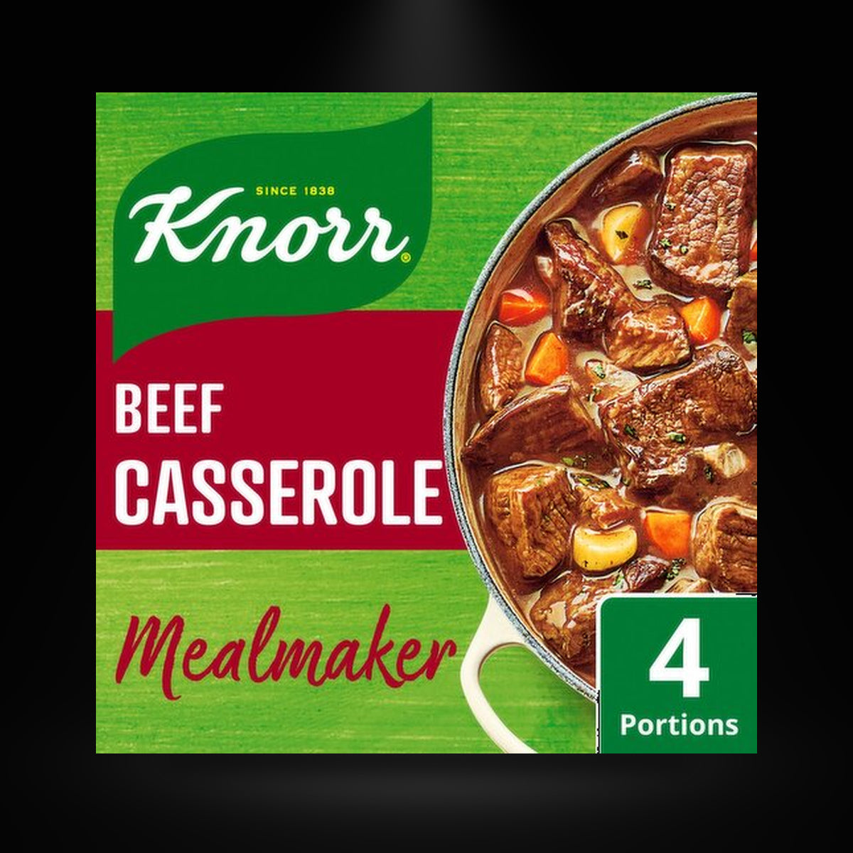 Knorr Beef Casserole on a black background with an overhead spotlight