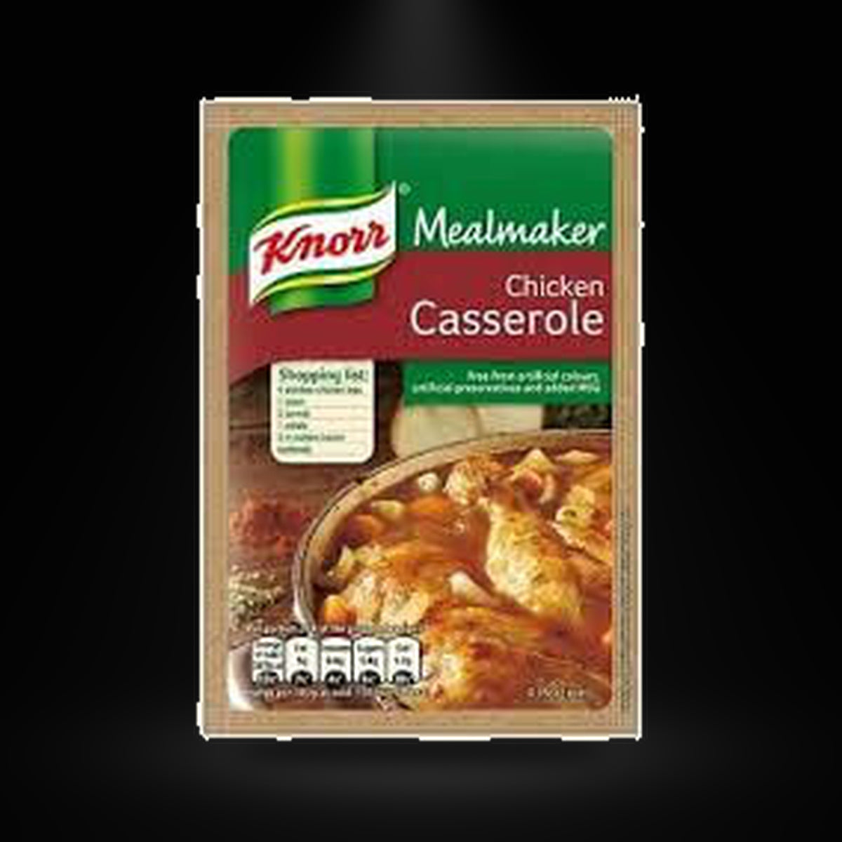 Knorr Chicken Casserole on a black background with an overhead spotlight