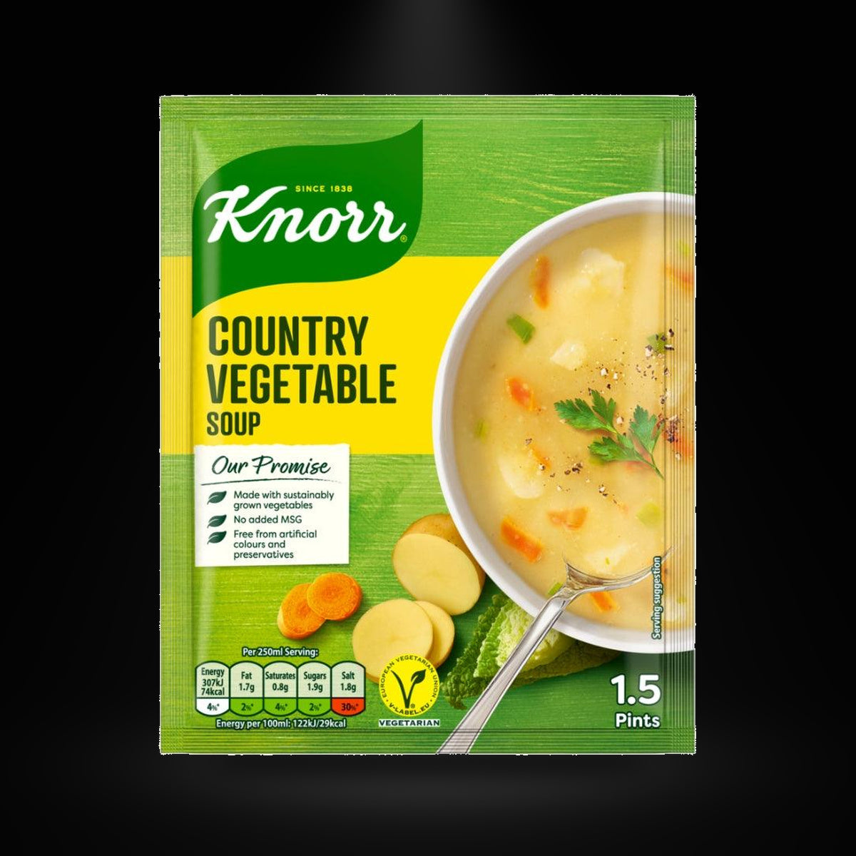 Knorr Country Veg Soup on a black background with an overhead spotlight