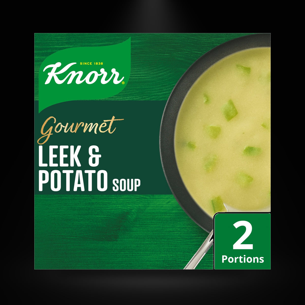 Knorr Leek&Potato on a black background with an overhead spotlight