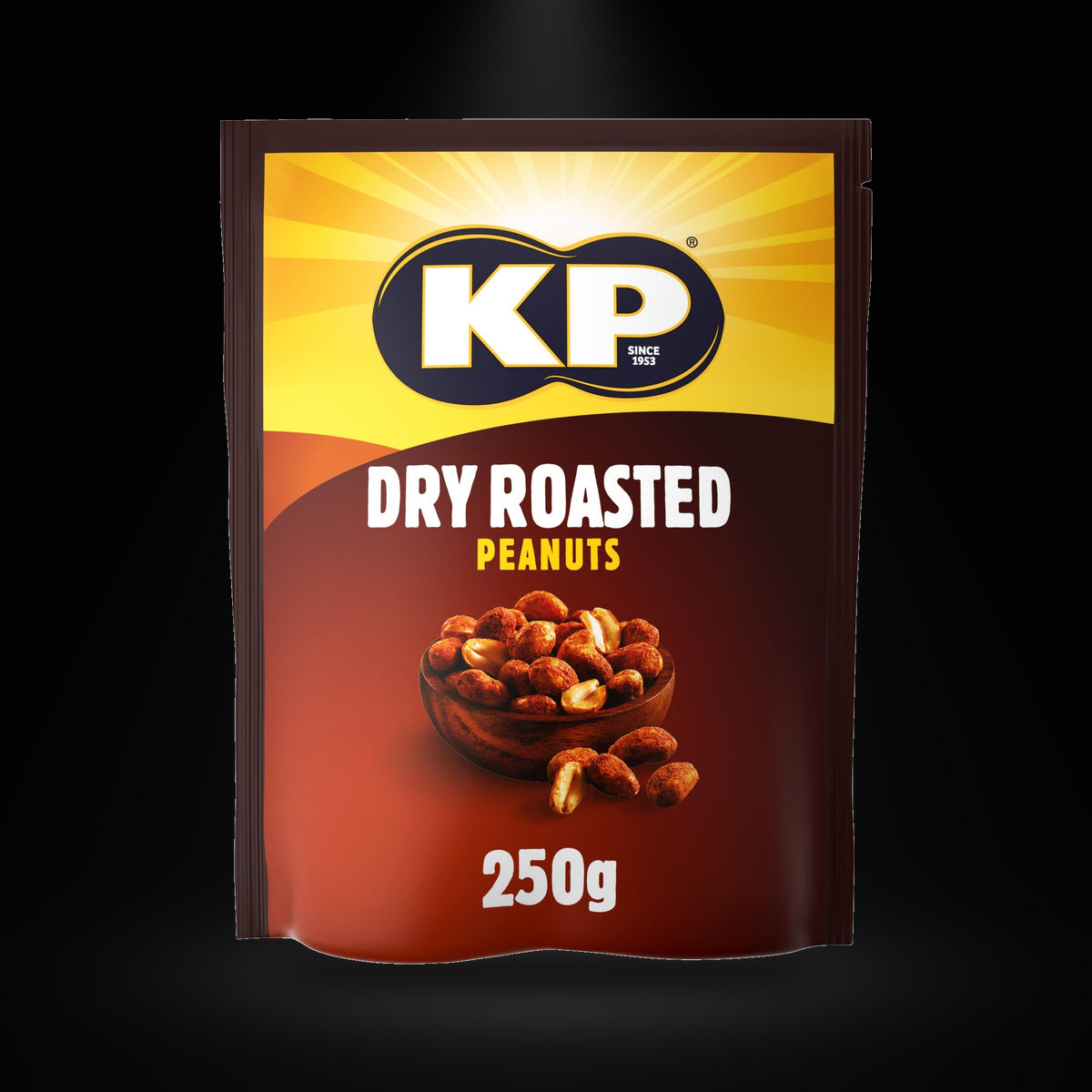KP Dry Roasted Peanuts on a black background with an overhead spotlight