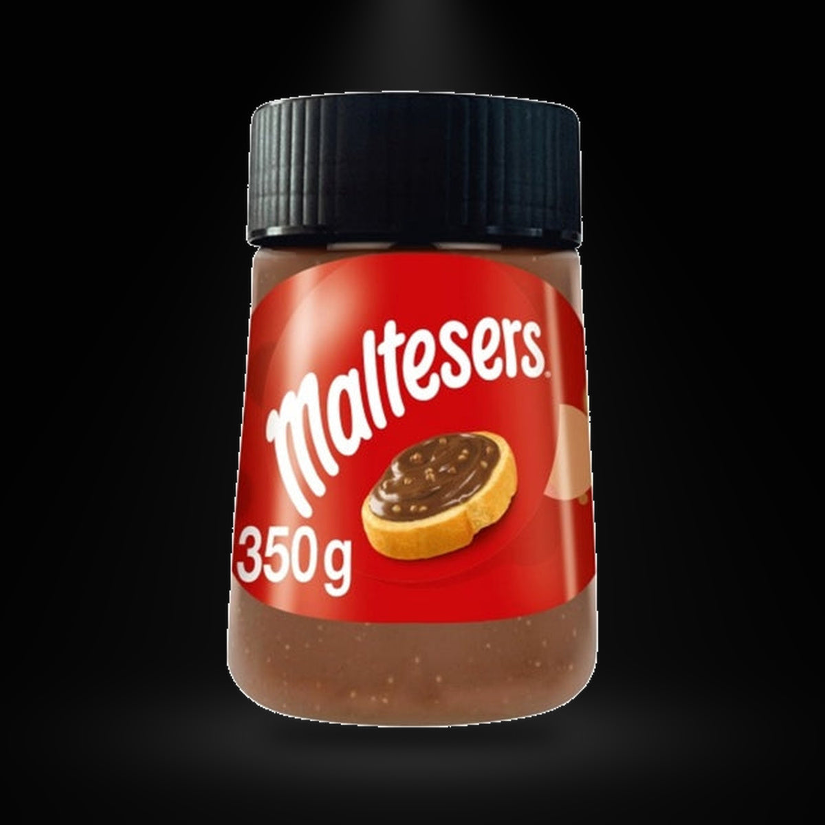 Maltesers Spread 350G on a black background with an overhead spotlight