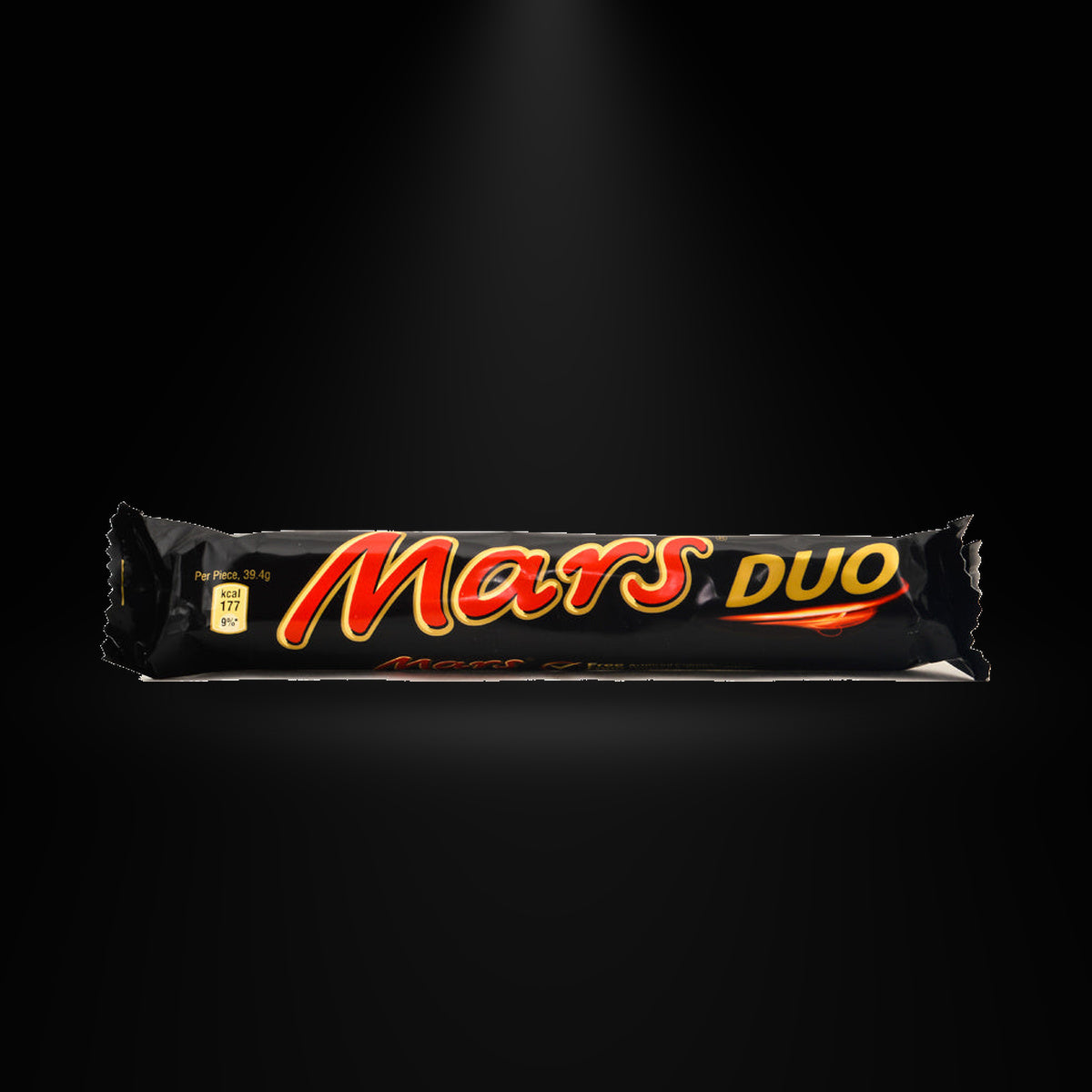 Mars Duo 69g on a black background with an overhead spotlight