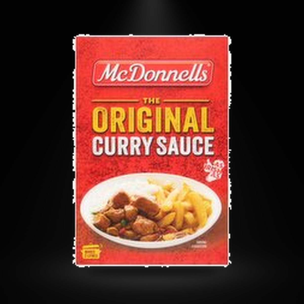 McDonells curry sauce 500g on a black background with an overhead spotlight