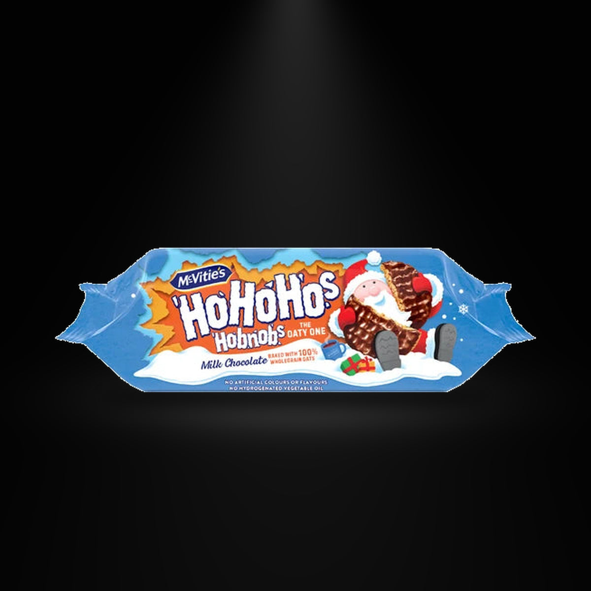 McVitie S Milk Chocolate Hobnobs - 262g on a black background with an overhead spotlight