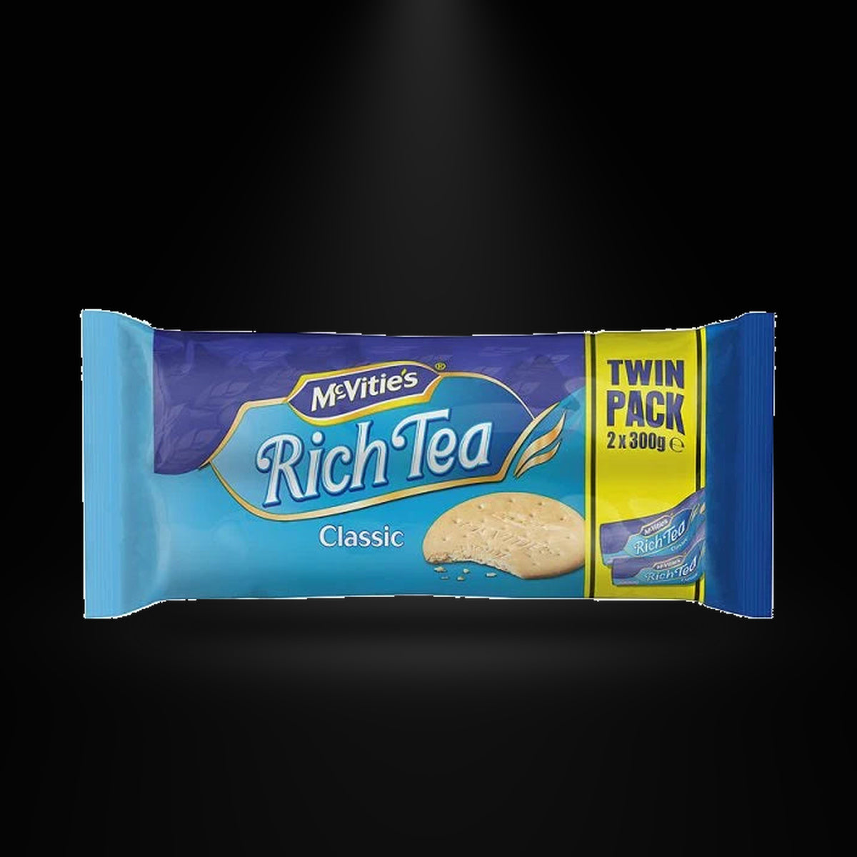 Mcvitie's Rich Tea on a black background with an overhead spotlight