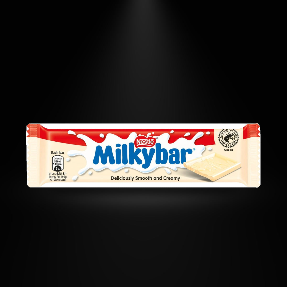 Milkybar Medium 25gm on a black background with an overhead spotlight