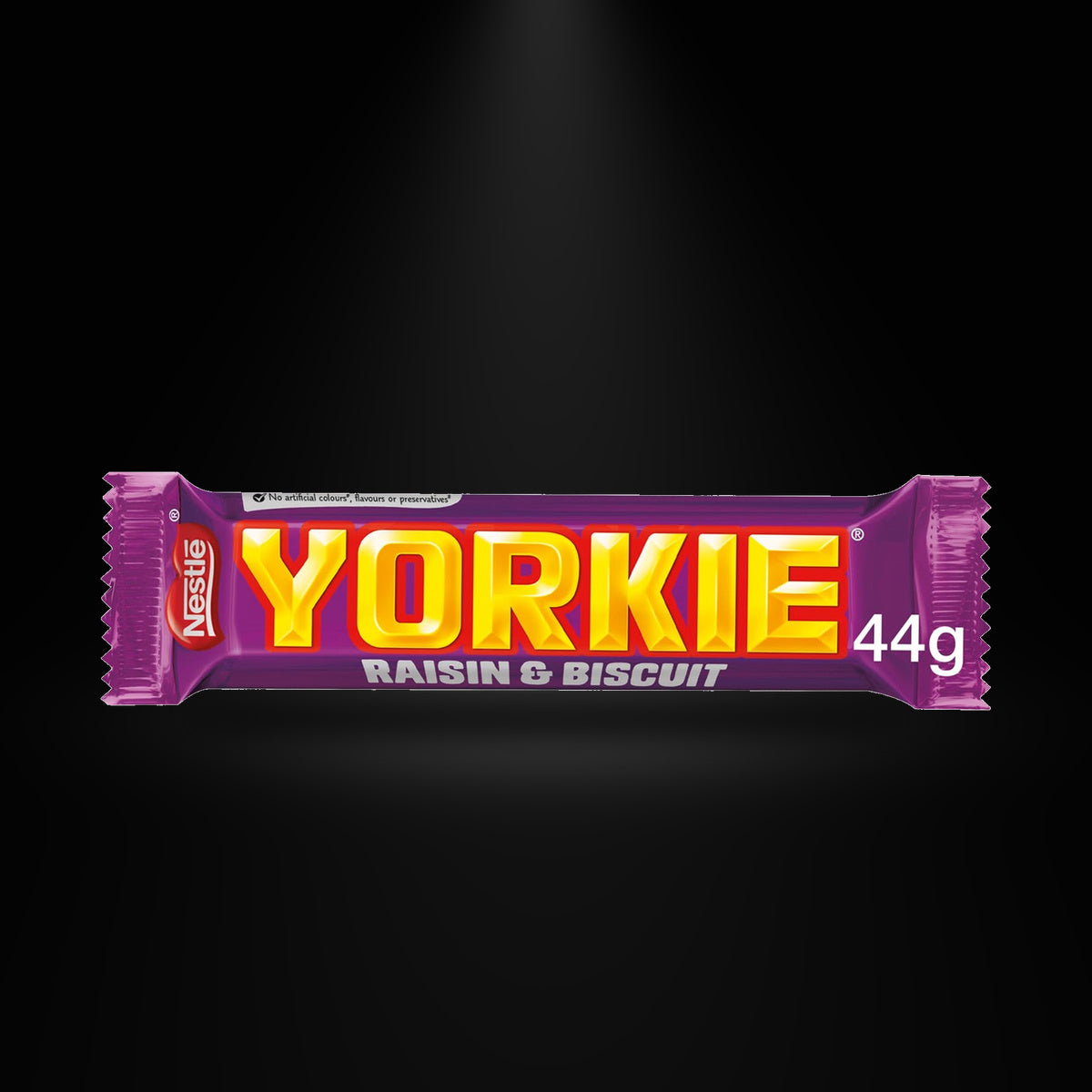 Nestle Yorkie Raisin&Biscuit 44G on a black background with an overhead spotlight